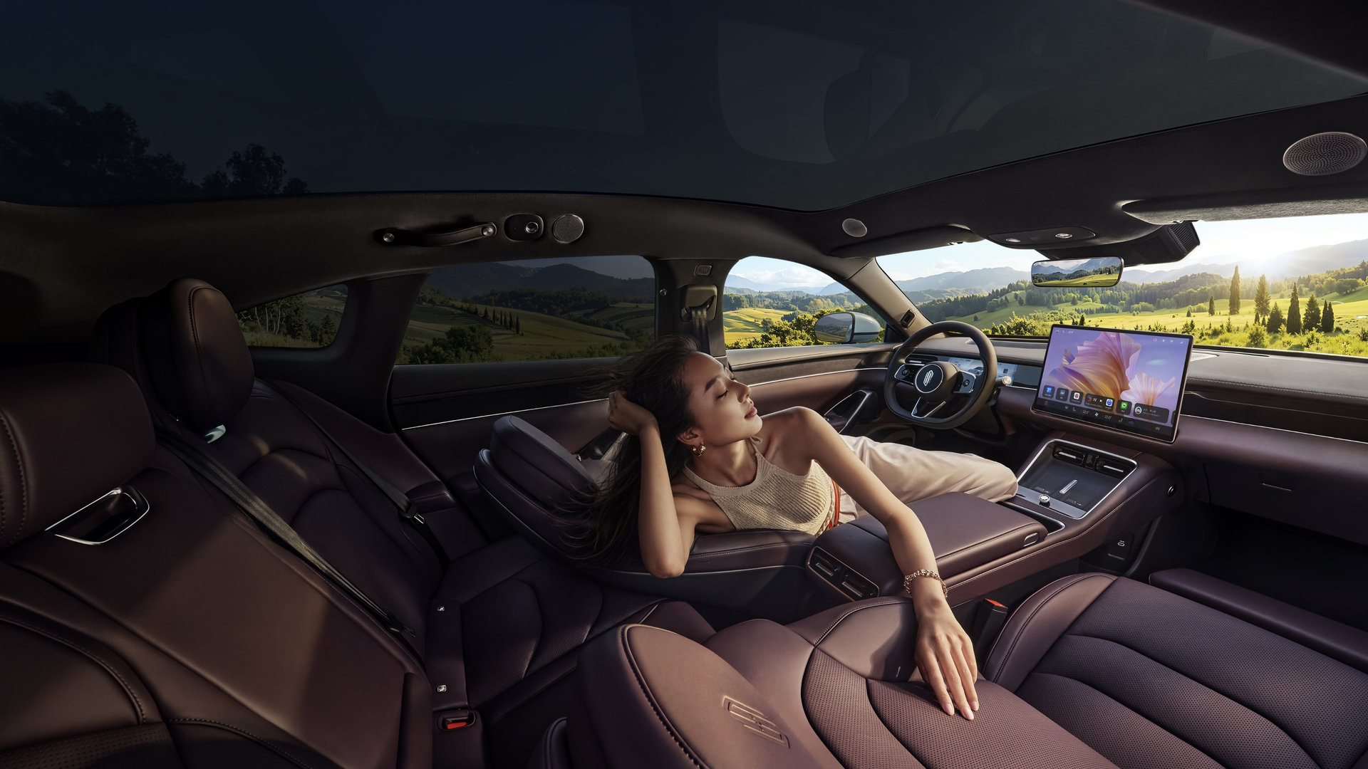 User reclining in the SAIC Z7-Z7T cockpit, showcasing the vehicle's spacious interior