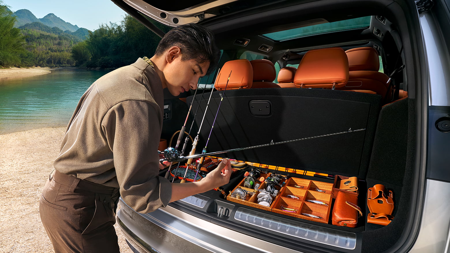 The Galaxy-colored AITO M8 with the trunk open, showcasing the expansive cargo space