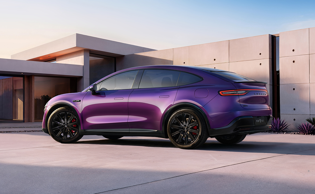 Rear view of the Luxeed R7 in Midnight Purple, showcasing its sporty rear spoiler